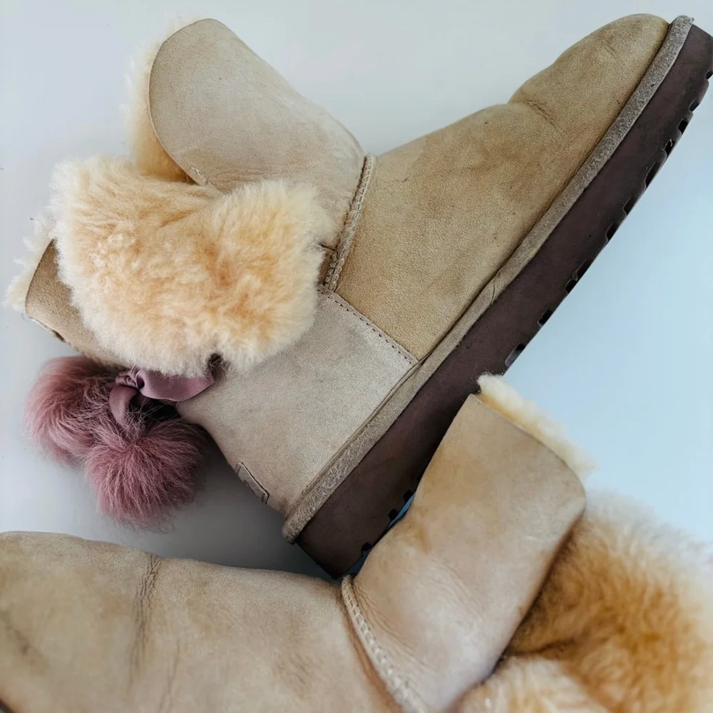 UGG Beige Sheepskin Winter Boots with Pink Pom Poms